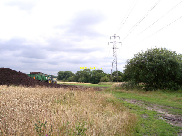 Photo 6"x4" Tractor tipping fertilizer next to path to Brook Head Farm Gemini c2010