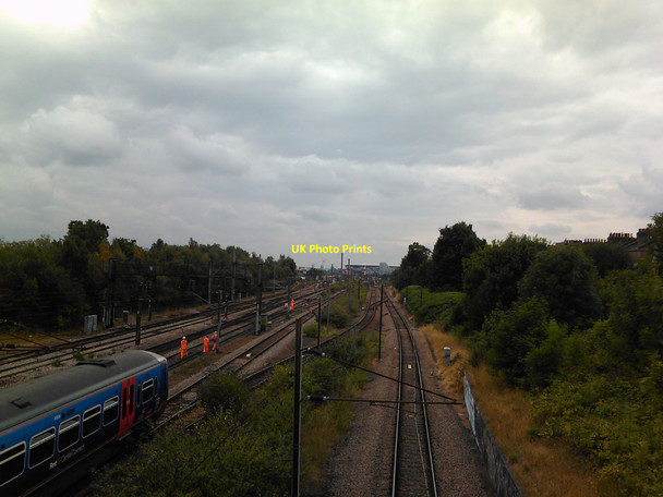 Photo 6"x4" View of the East Coast Mainline from the footbridge adjacent to Finsbury Park Hornsey c2010