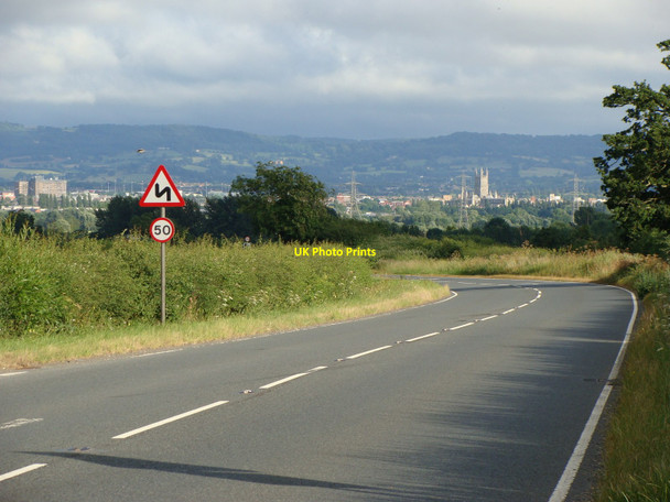 Photo 6"x4" Road sign on the A417 looking towards Gloucester Woolridge c2010