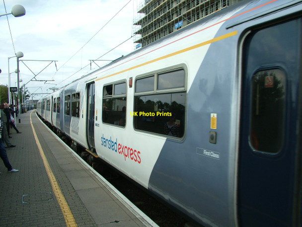 Photo 6"x4" Stansted Express leaving Tottenham Hale Tottenham c2010