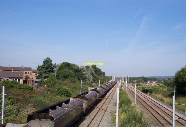Photo 6"x4" West Coast Main Line from Lily lane road bridge Abram c2010