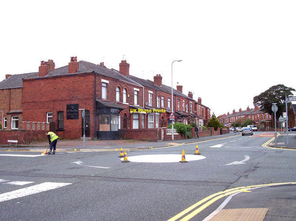 Photo 6"x4" Running repairs to mini roundabout at Gidlow Lane Wigan c2010