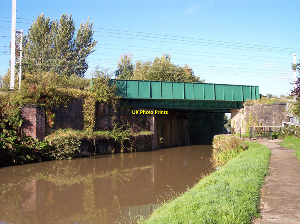Photo 6"x4" The West Coast Main Line crosses the Leigh Branch of the Leeds Liverpool Canal Abram c2010