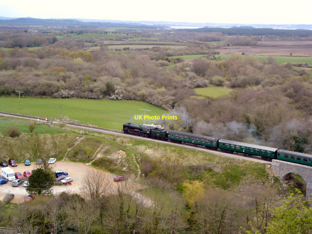 Photo 6"x4" Steam Train passing Corfe Castle Corfe Castle c2004