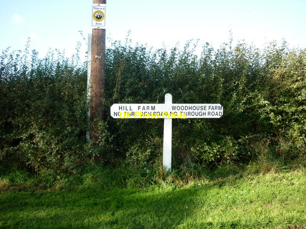 Photo 6"x4" A road sign near Swine Swine c2010
