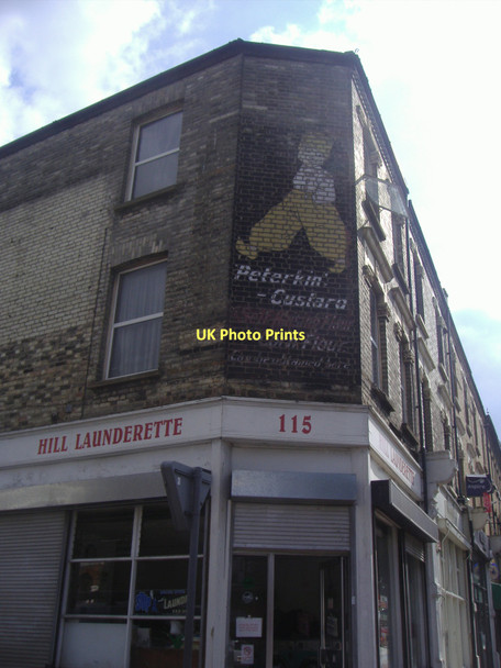 Photo 6"x4" Painted advertisement, corner of Sangora Road and St Johns Hill Wandsworth c2009