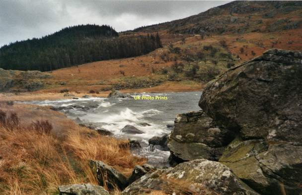 Photo 6"x4" Llynnau Mymbyr, rocks and rough water Capel Curig c1999