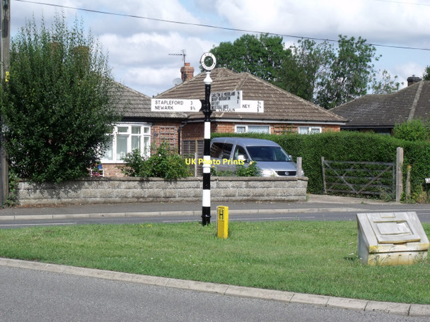 Photo 6"x4" Signpost at Junction of High street, Linga and Croft lanes Bassingham c2011