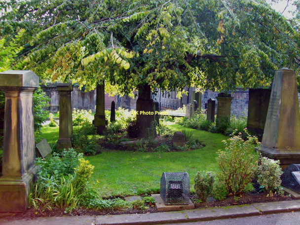 Photo 6"x4" Churchyard garden at St Cuthbert's Dean\/NT2474 c2011