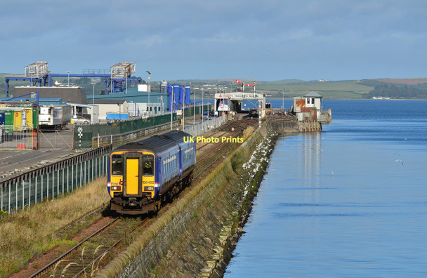 Photo 6"x4" Train leaving Stranraer Harbour. Stranraer c2011