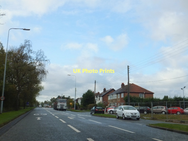 Photo 6"x4" Tarvin bypass; car park for light industry on the right Hollowmoor Heath c2011