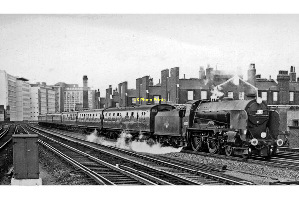 Photo 6"x4" Waterloo - Yeovil Junction train approaching Vauxhall Westminster c1962