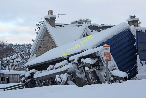Photo 6"x4" Derailed goods wagon at Carrbridge Ellan c2010
