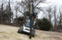 Skid Steer Post Driver Attachment With Power Tilt and Grapple (One Man Operation) Skid Steer Post Driver Attachment With Power Tilt and Grapple (One Man Operation)