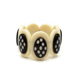 Tyrina Oval Elastic Resin Bracelet with Polka Dot Design