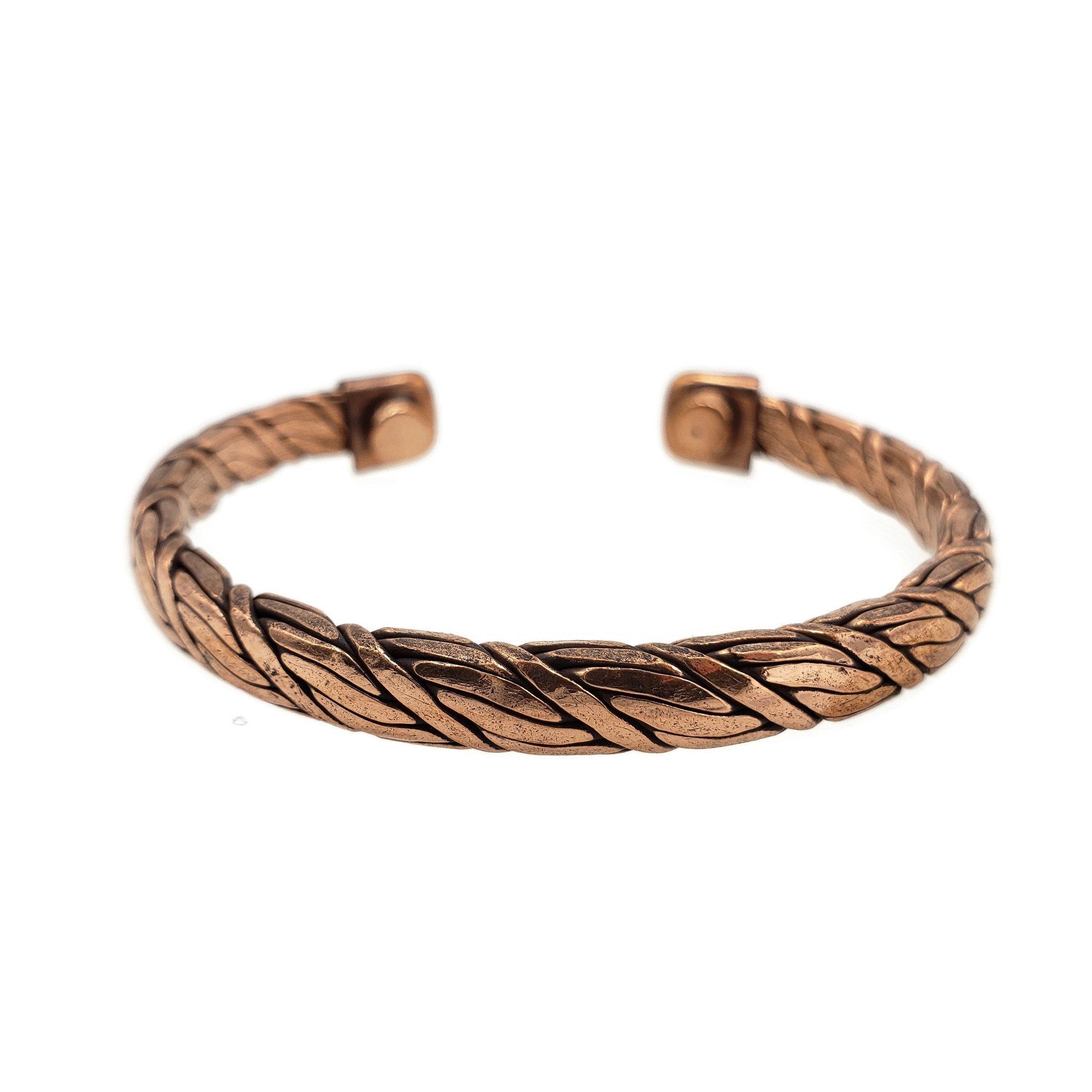 Handwoven copper bracelet with magnets at end for energetic healing.