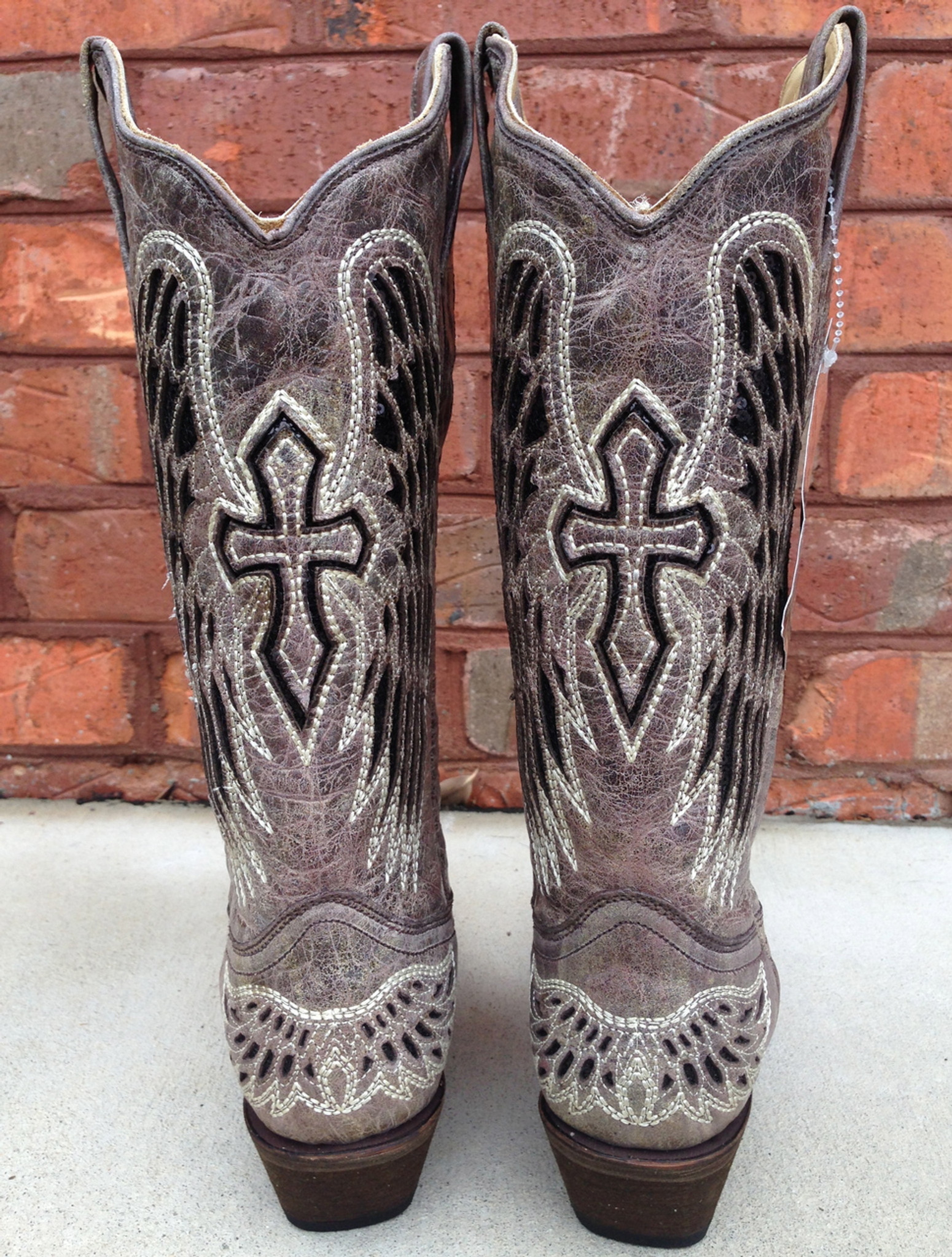 cross boots with wings