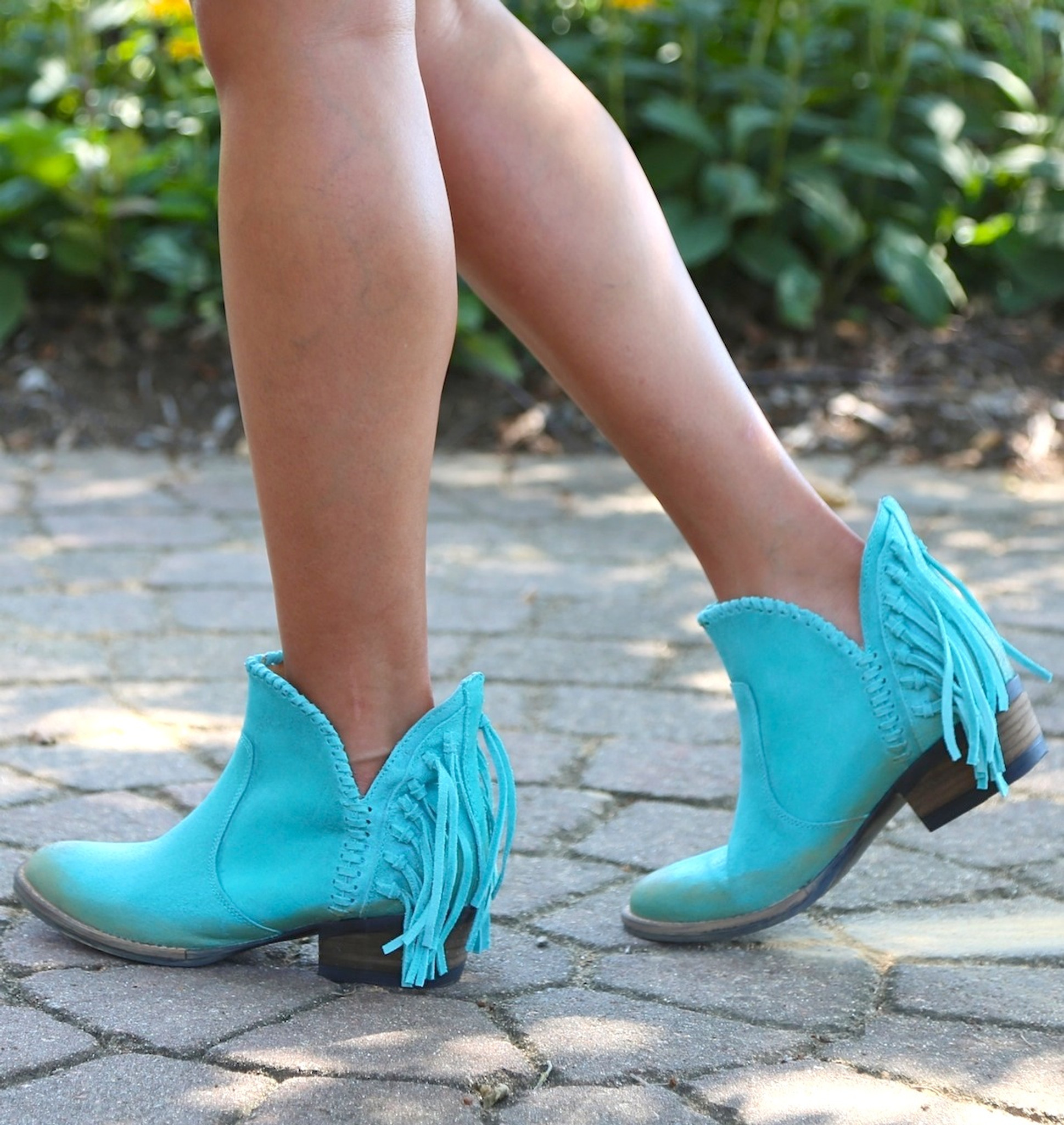 turquoise booties with fringe