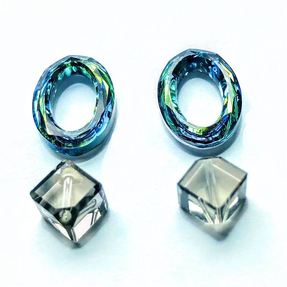 swarovski-4137-22mm-oval-ring-beads-crystal-sahara-and-5600-off-set-cube-black-diamond-6.jpg