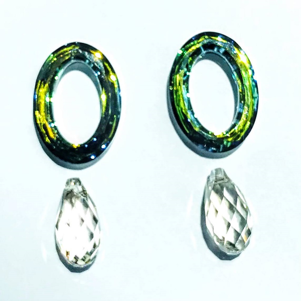 swarovski-4137-22mm-oval-ring-beads-crystal-sahara-and-6010briolette-crystal-silver-shade.jpg