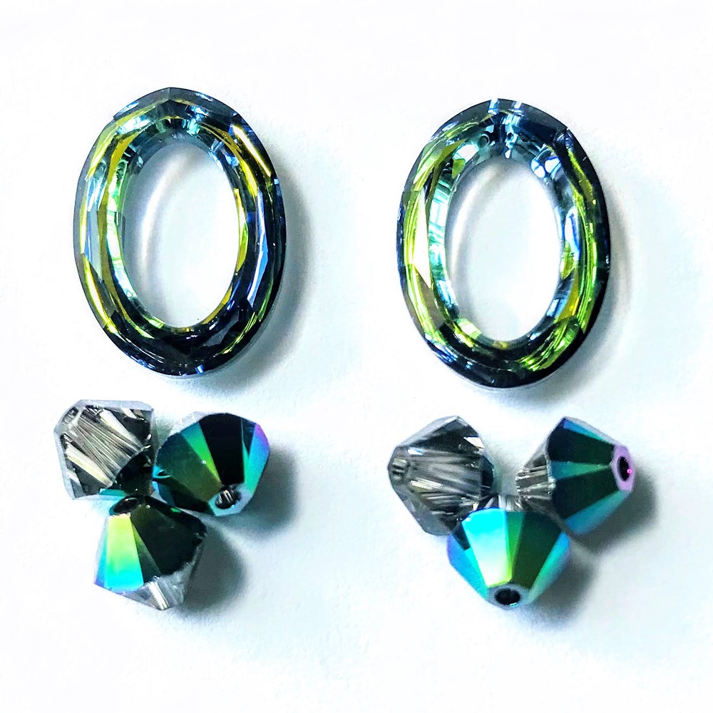 swarovski-4137-22mm-oval-ring-beads-crystal-sahara-crystal-scarabeaus-green-2.jpg