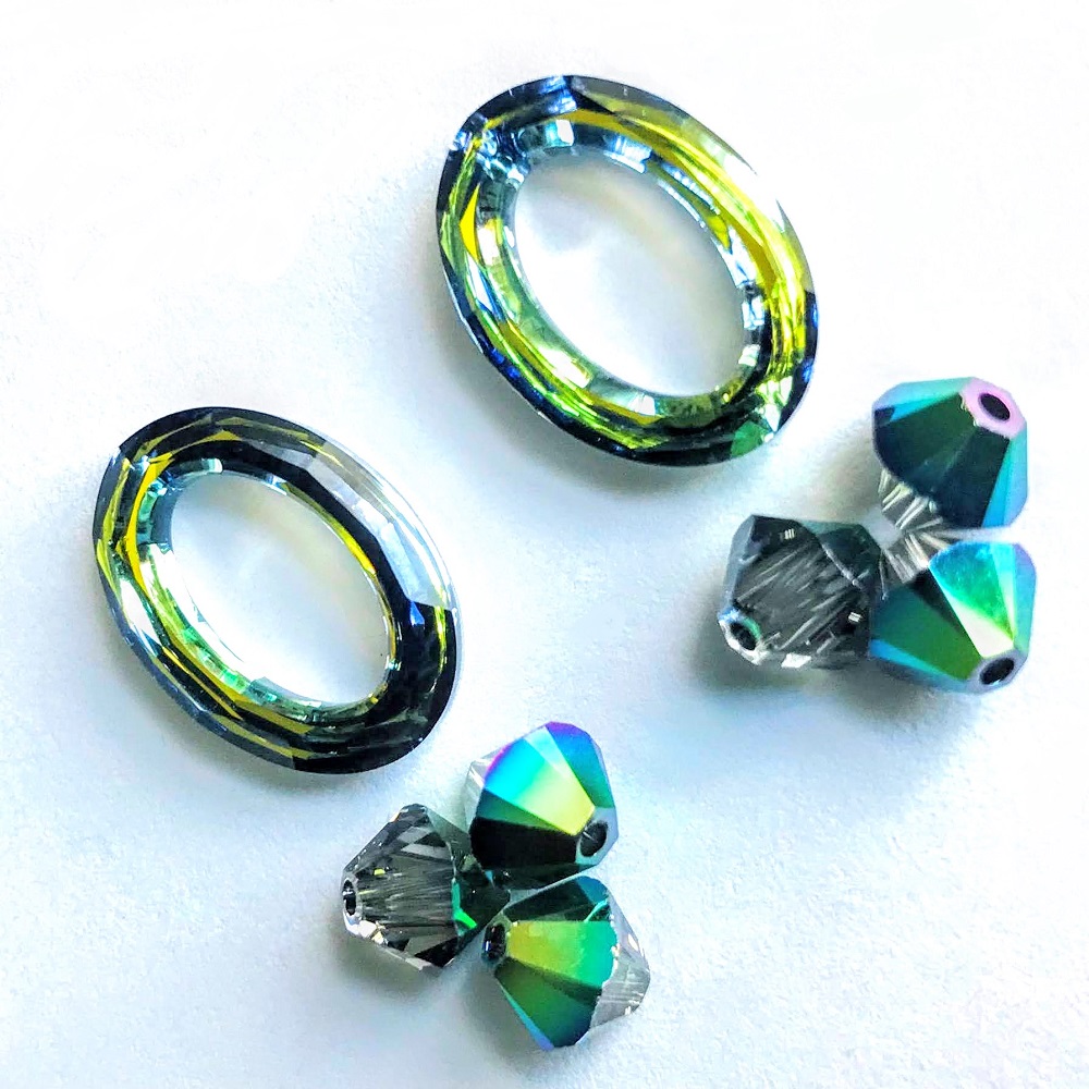 swarovski-4137-22mm-oval-ring-beads-crystal-sahara-crystal-scarabeaus-green-4.jpg