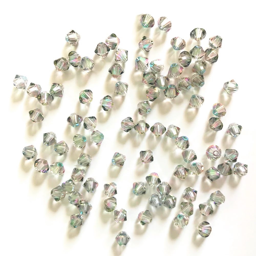 swarovski-crystal-5328-bicone-beads-crystal-paradise-shine-sale.jpg