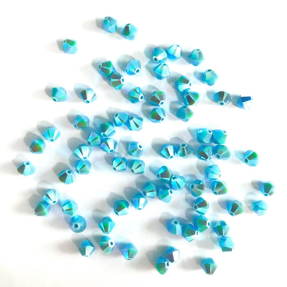 swarovski-crystal-5328-bicone-beads-turquoise-ab-2x-sale.jpg