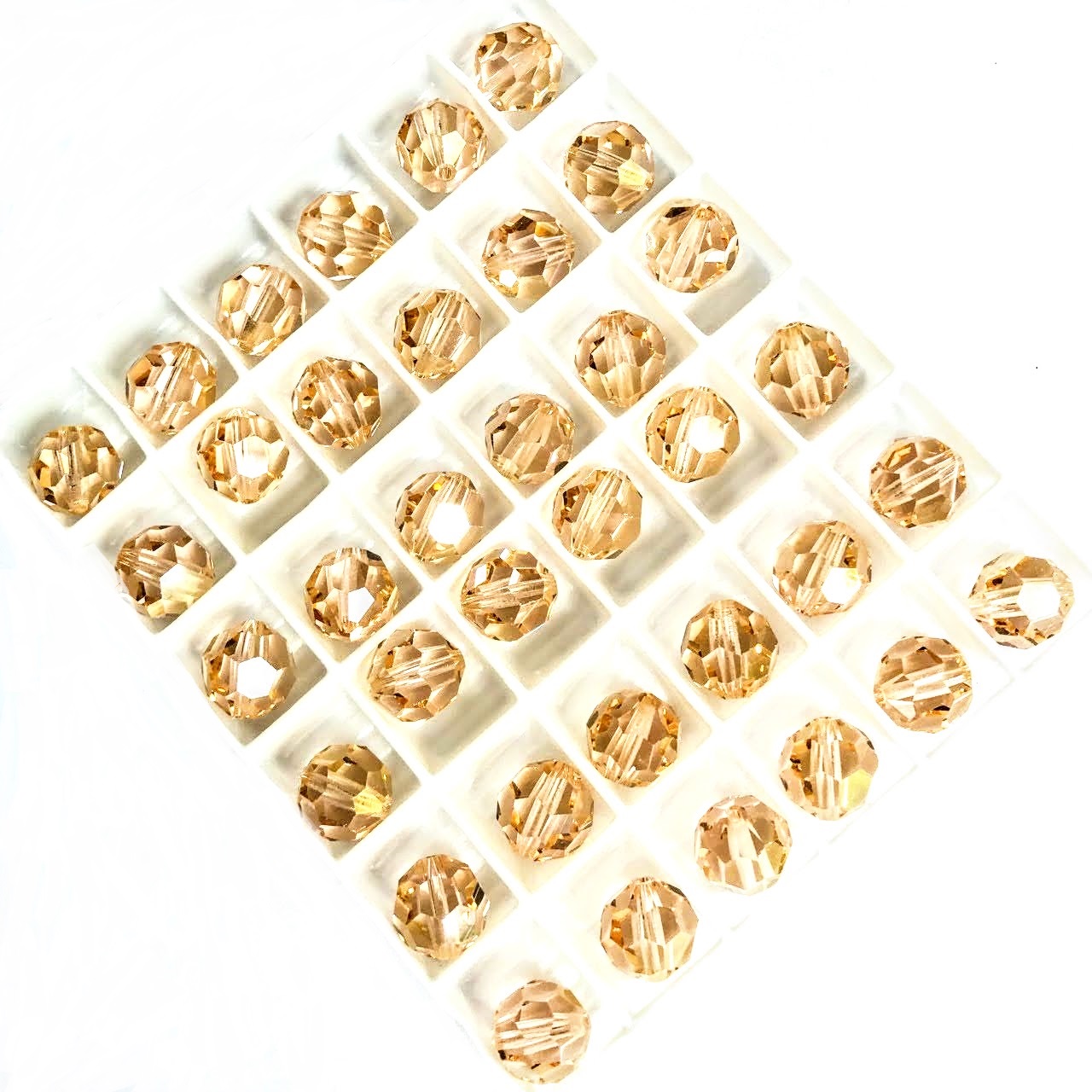 swarovski-crystal-beads-crystal-copper-5000-rounds-light-peach-champagne-1.jpg