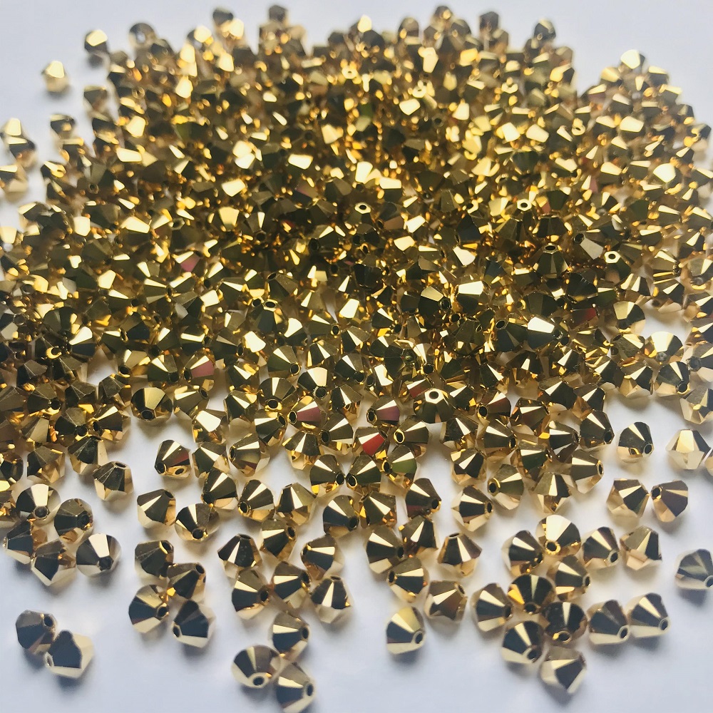 swarovski-crystal-bicone-beads-aurum-2x-24k-gold-sale.jpg