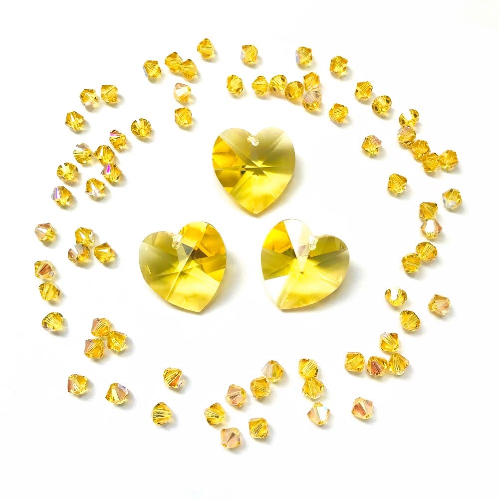 swarovski-crystal-heart-beads-with-light-topaz-ab-beads.jpg