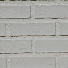 Tritan BP Faux Brick 43.5 in. x 23.75 in. Polyurethane Interlocking Siding Panel in Rusty Amber