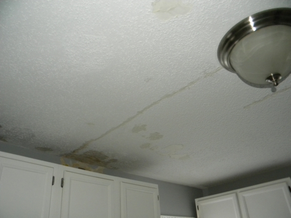 damaged-and-patched-popcorn-ceiling.jpg