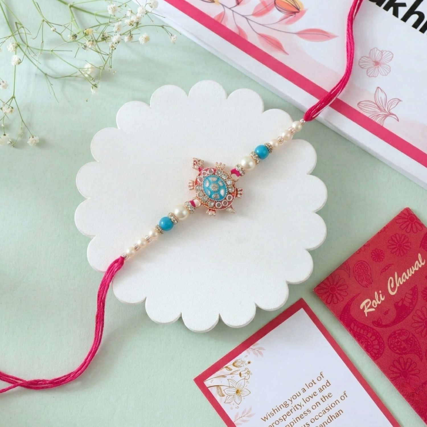 Turtle Raki Send Divine Pearl Ganesha Rakhi Online To NewZealand | Rakhi.com