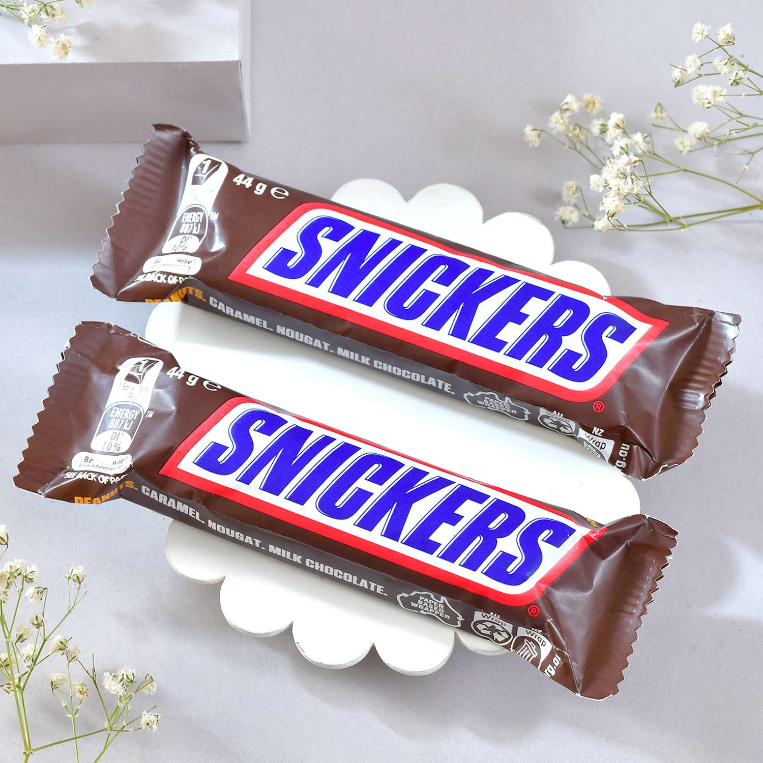 Evil Eye Rudraksha Rakhi with Snickers Chocolates - Rakhi.com