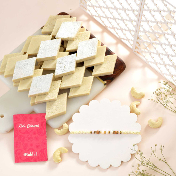 Hand Crafted White Beads Rakhi With Kaju Katli