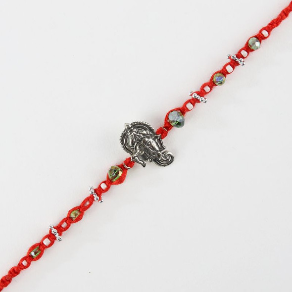 Lord Ganesha Rakhi with Red Thread and Beaded Accents