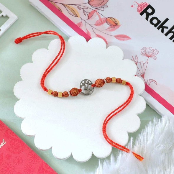 Om Symbol Rakhi with Rudraksha Beads on Red Thread