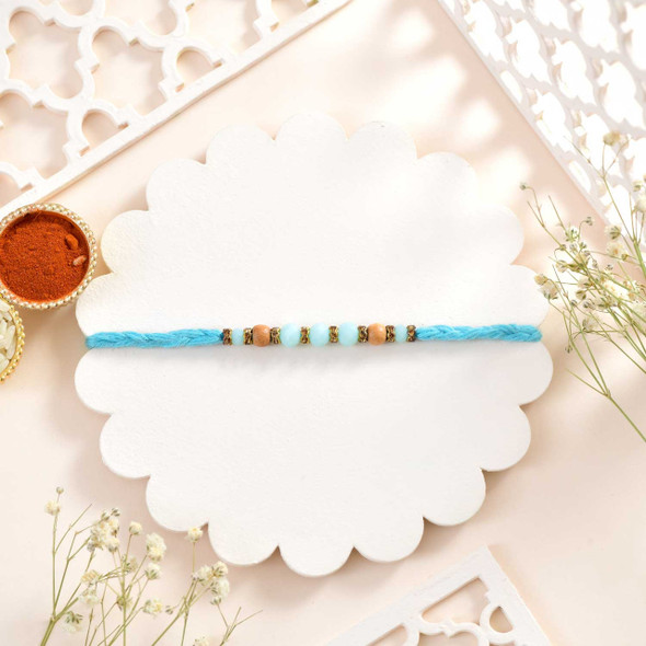 Hand Braided Dora Rakhi With Dryfruits