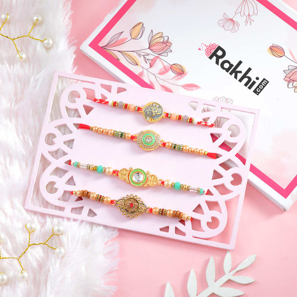 Elegant Set of Finest Four Rakhi with Kaju Sweet