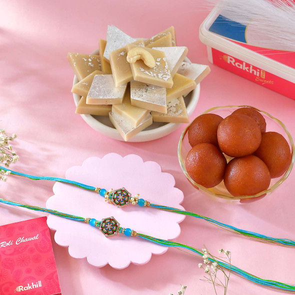 Aqua Fusion Rakhi Duo With Traditional Sweets
