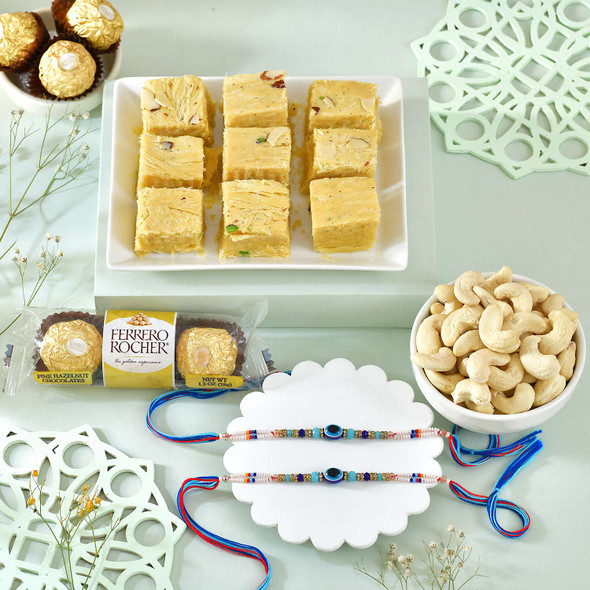 Two Evil Eye Rakhi with Gourmet Hamper