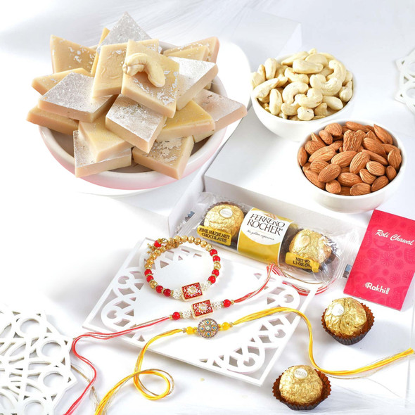 Elegant Rakhi Trio with Gourmet Treats