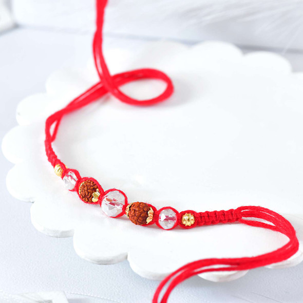 Sacred Rudraksha Rakhi with Crystal Beads & Red Thread