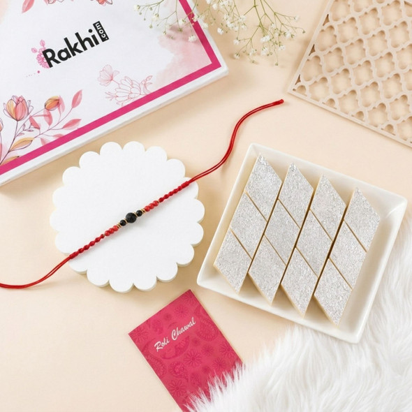 Traditional Rudraksha Bead Rakhi with Kaju Katli