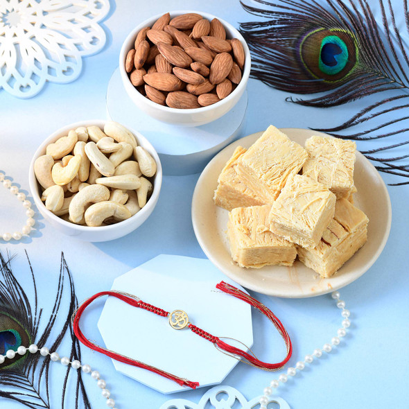 Gold Plated Divine Om Rakhi with Dry Fruit & Sweet Hamper