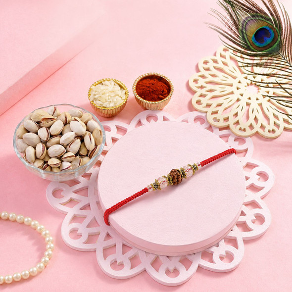 Premium Rudraksha & Clear Crystal Rakhi With Pistachio