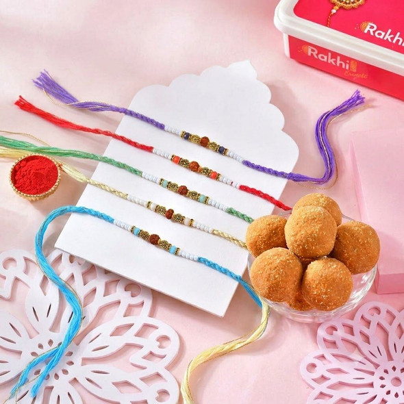 Five Rakhi Set and Besan Laddu Delight