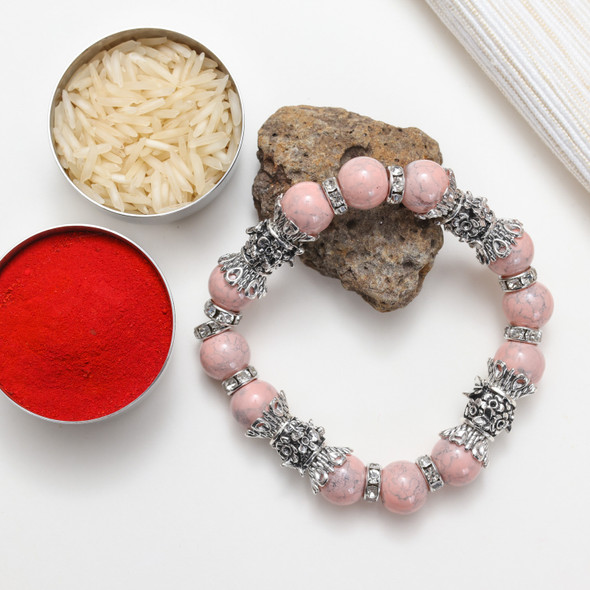 Beautiful Pink Stone Bracelet designed with oxidized metal beads.  An idle gift for Bhabhi, Sister or some one special.