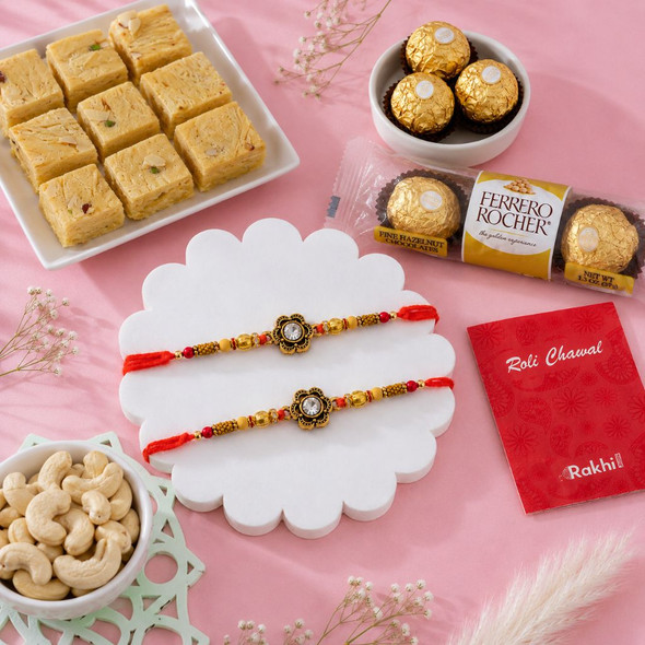 Elegant Diamond Flower Rakhis with Gourmet Hamper